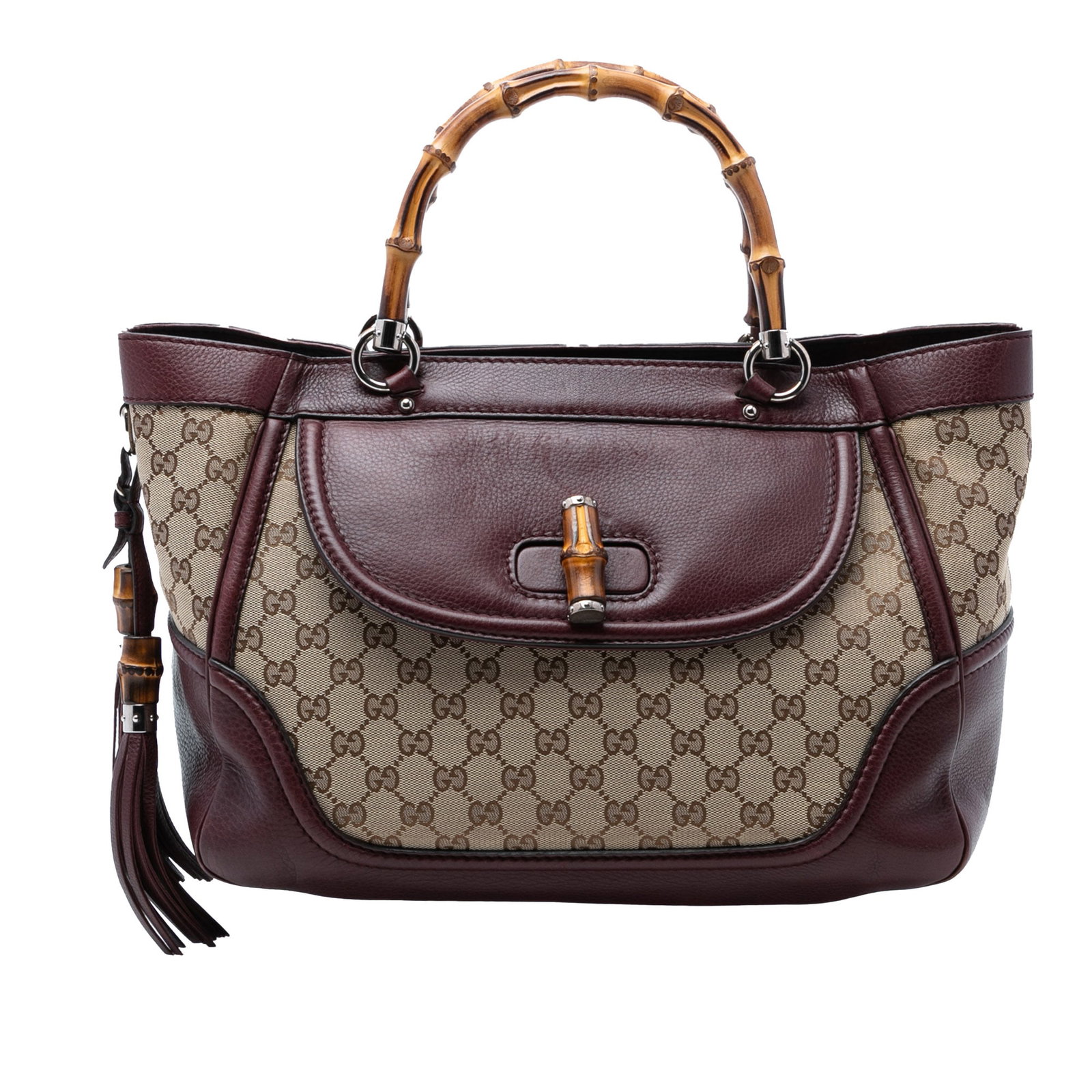 Gucci Bamboo Tassel Canvas Tote Bag Medium GG: Gucci Bamboo Tassel Canvas Tote Bag Medium GG This Gucci Medium GG Canvas New Bamboo Tassel Tote features a beige canvas body with leather trim and distinctive tassel details. The bag is designed with