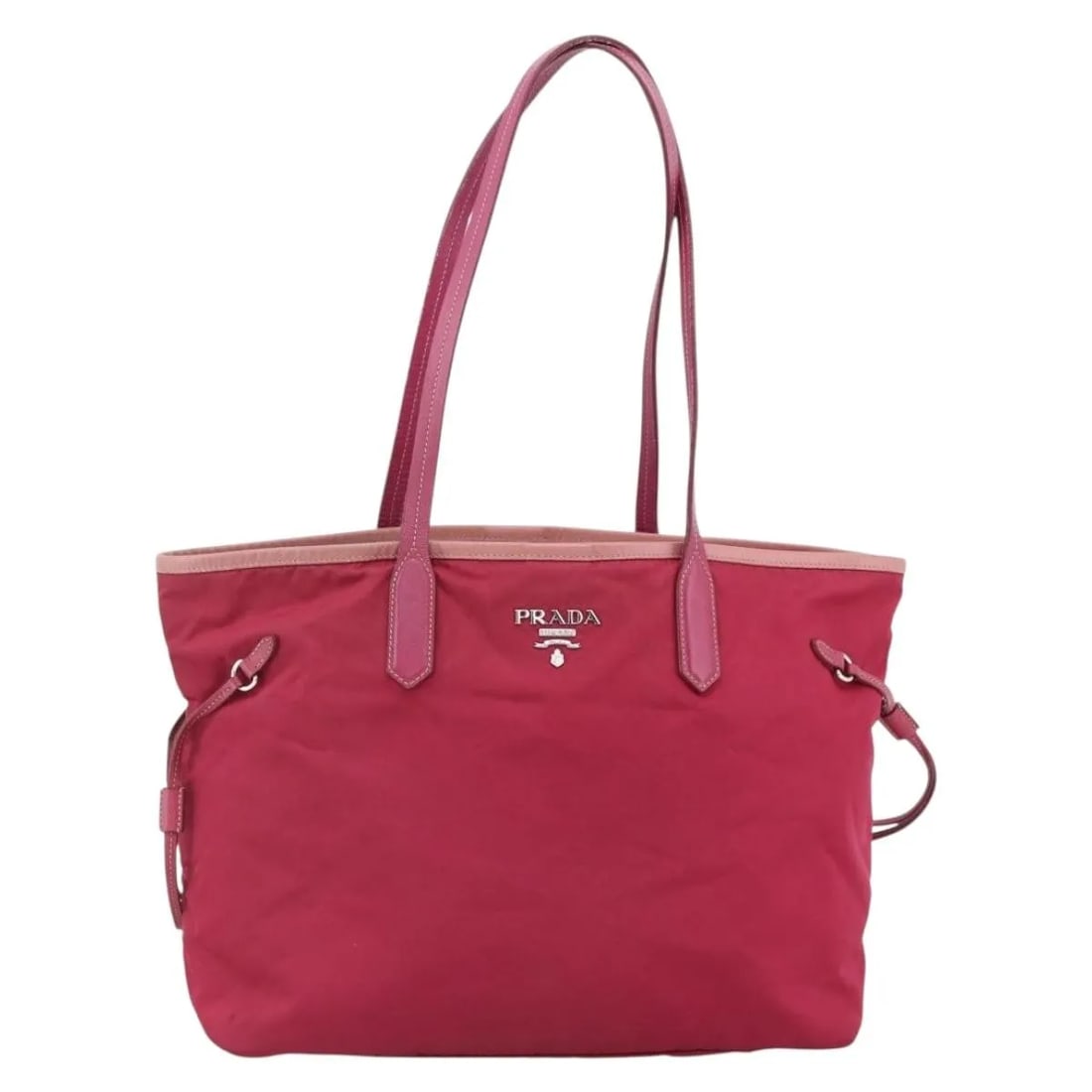 Pink Nylon Tote Bag by Prada Vintage Collection: Pink Nylon Tote Bag by Prada Vintage Collection This Prada Vintage Tote is crafted from pink nylon and designed for women. Made in Italy, it features a spacious interior and classic tote silhouette. T