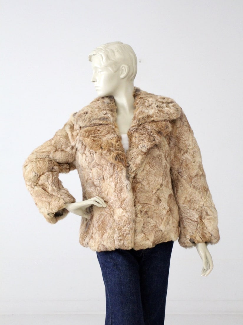 1970s Vintage Rabbit Fur Coat Brown Large Collar Short Jacket: 1970s Vintage Rabbit Fur Coat Brown Large Collar Short Jacket Experience the elegance of a bygone era with this ultra-soft vintage 1970s rabbit fur coat. Crafted from rich brown fur, this stylish shor