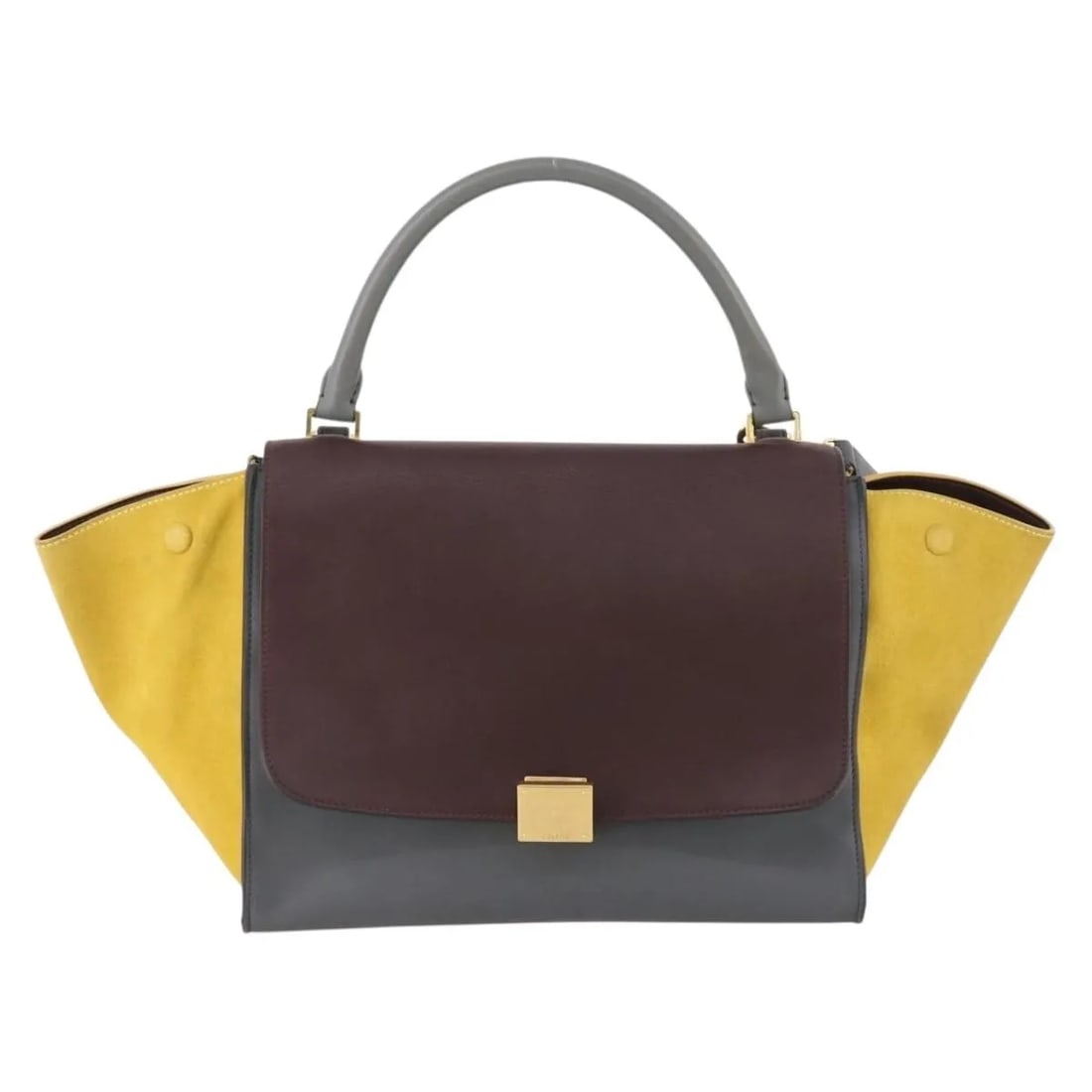 Leather Tricolor Trapeze Handbag by Celine Italy 30cm: Leather Tricolor Trapeze Handbag by Celine Italy 30cm The Celine Tricolor Trapeze Bag is crafted from multicolored leather and designed for women. This Italian-made handbag features a structured silho