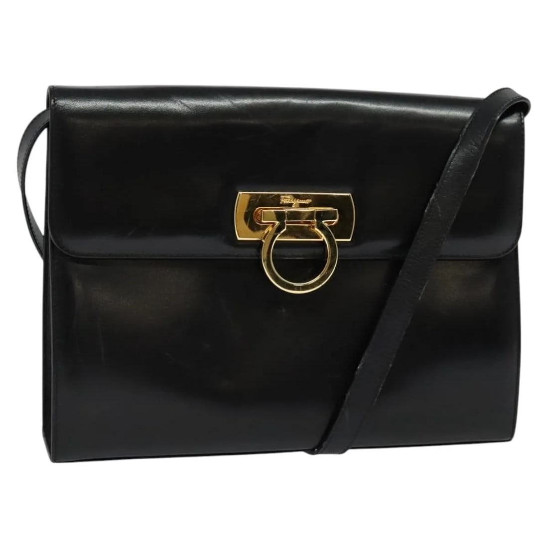 Black Leather Shoulder Bag Salvatore Ferragamo Gancini: Black Leather Shoulder Bag Salvatore Ferragamo Gancini This Salvatore Ferragamo Gancini shoulder bag features a classic black leather exterior with the iconic Gancini design. Designed for women, it of
