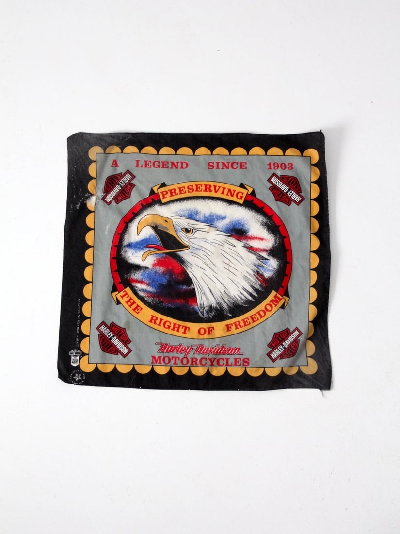 Vintage Harley Davidson Cotton Bandana Classic Logo Scarf: Vintage Harley Davidson Cotton Bandana Classic Logo Scarf Celebrate the spirit of freedom with this vintage Harley Davidson bandana. Featuring classic logos and imagery, this wonderfully worn scarf is