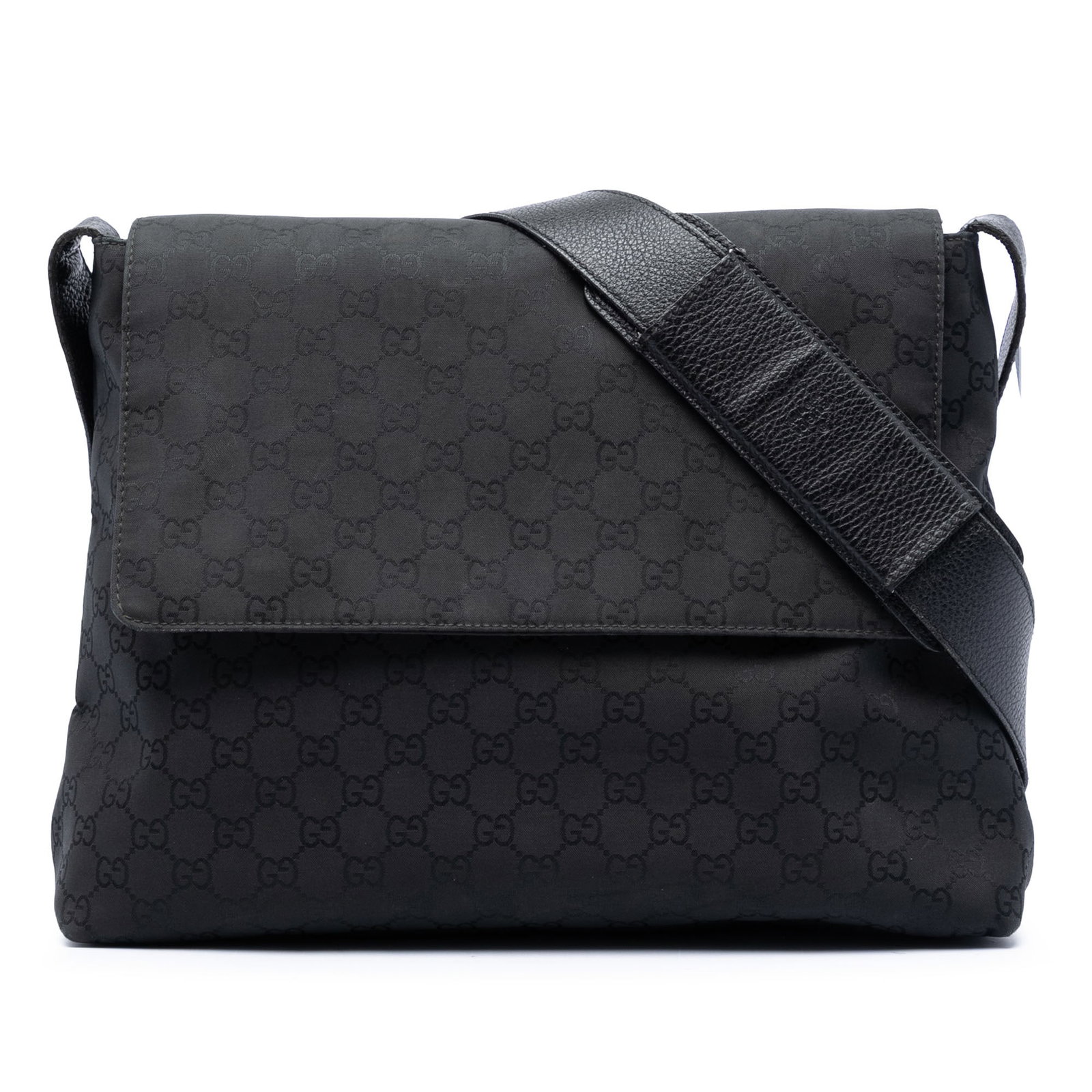 Gucci GG Canvas Crossbody Messenger Bag Black: Gucci GG Canvas Crossbody Messenger Bag Black Gucci GG Canvas Messenger Bag in black with a canvas body and an adjustable leather shoulder strap. The design features a front flap with magnetic snap cl