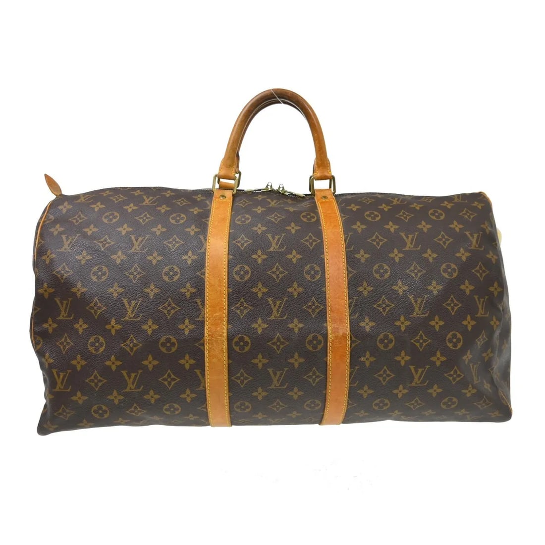 Louis Vuitton Keepall Travel Bag in Brown Monogram Canvas: Louis Vuitton Keepall Travel Bag in Brown Monogram Canvas Louis Vuitton Keepall in brown monogram canvas. This unisex bag is made in France and is presented in fair condition with visible wear. The ex