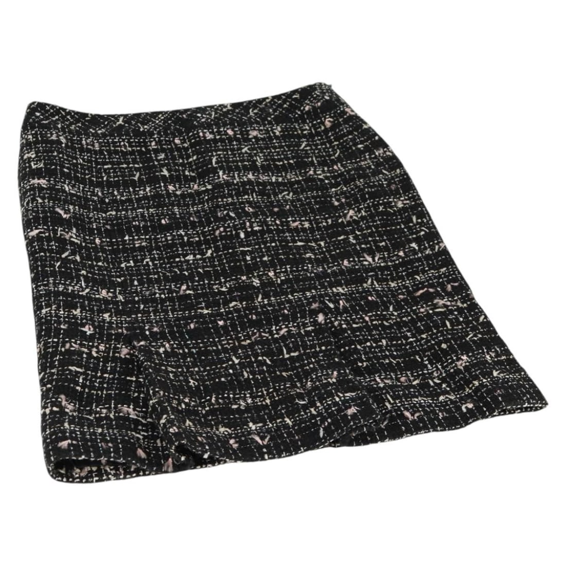 CHANEL CC Black Wool Tweed Women's Skirt France: CHANEL CC Black Wool Tweed Women's Skirt France Authentic CHANEL women's tweed skirt in black wool, made in France. This pre-owned piece shows reasonable wear and tear consistent with a B rank conditi