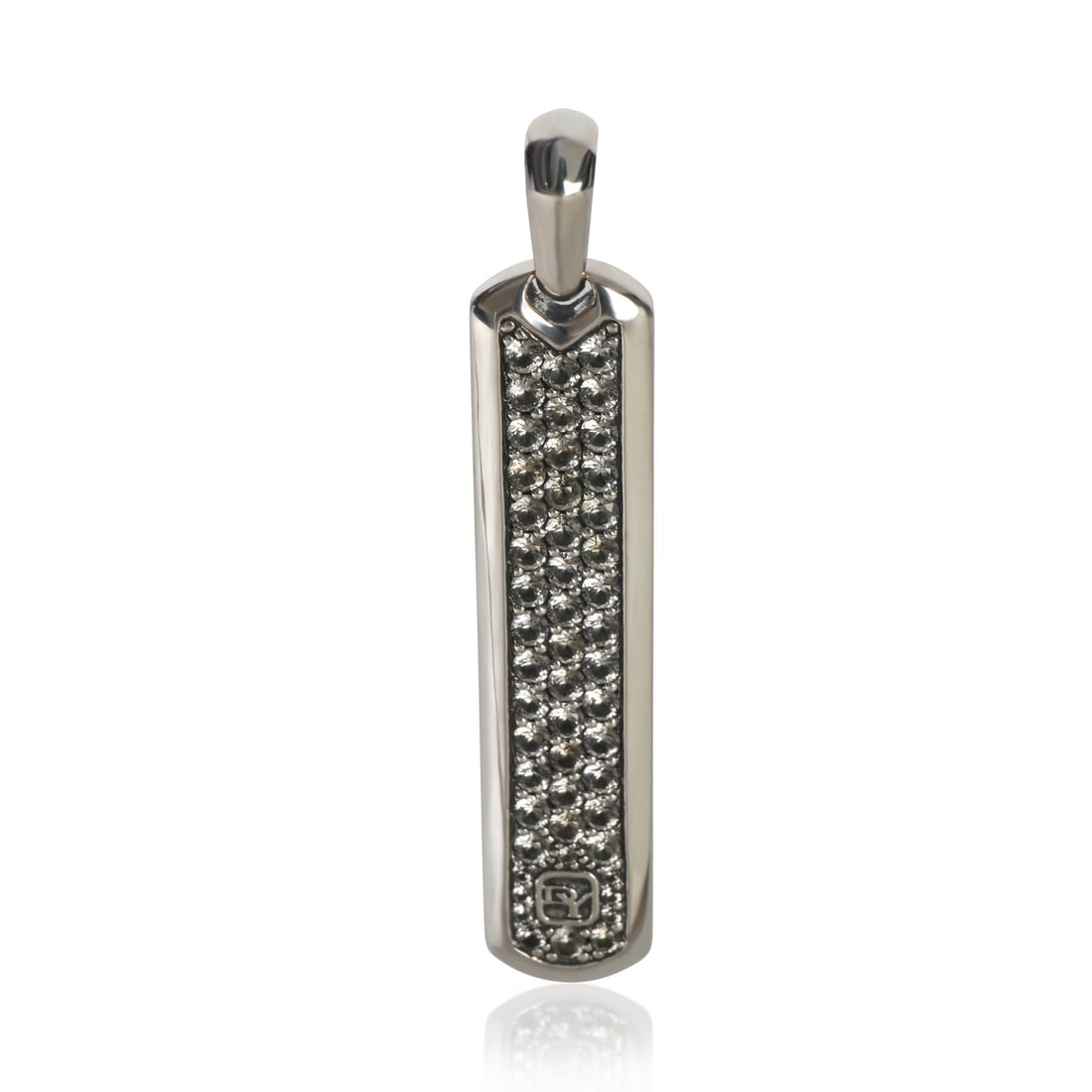 David Yurman Ingot Dog Tag Sapphire Sterling Silver Pendant: David Yurman Ingot Dog Tag Sapphire Sterling Silver Pendant This pre-owned David Yurman Ingot Dog Tag pendant is crafted from 925 sterling silver and features a striking round brilliant sapphire as th
