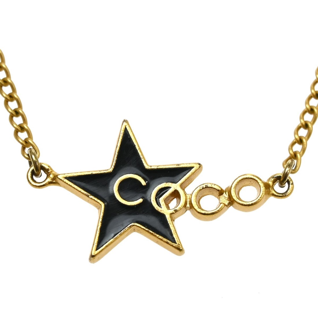 CHANEL 01P CC Star Gold Plated Pendant Necklace: CHANEL 01P CC Star Gold Plated Pendant Necklace Chanel pendant necklace featuring a CC star charm design in gold-plated metal with black detailing. Made in France, this necklace comes with its box and