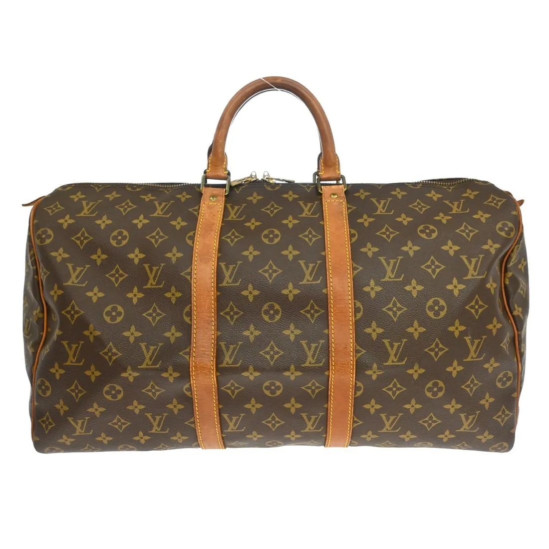 Louis Vuitton Keepall Brown Monogram Canvas Travel Bag: Louis Vuitton Keepall Brown Monogram Canvas Travel Bag Louis Vuitton Keepall in brown monogram canvas. This unisex bag is presented in fair condition with visible wear throughout. The exterior leather