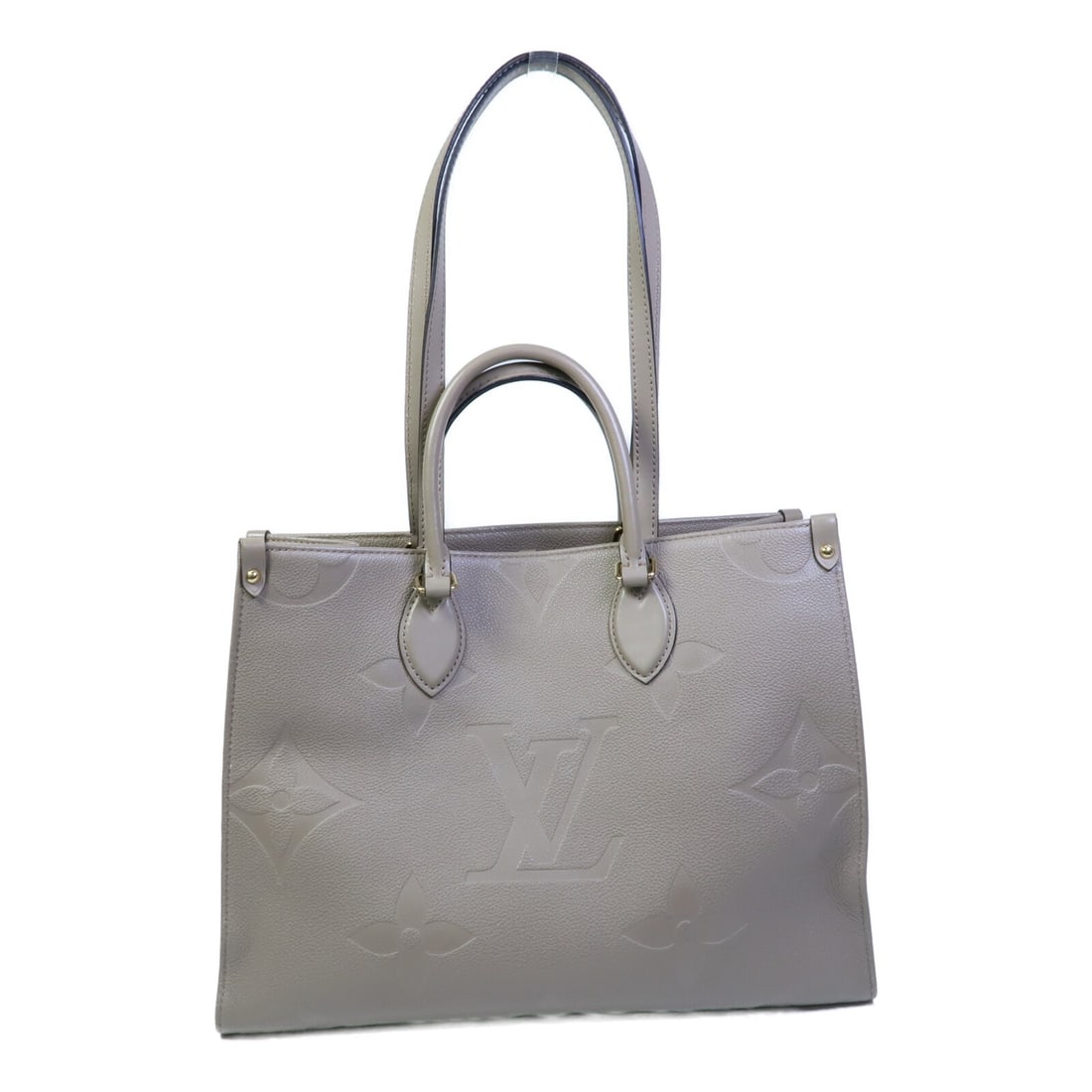 Louis Vuitton On The Go MM Empreinte Beige Calfskin Tote Bag: Louis Vuitton On The Go MM Empreinte Beige Calfskin Tote Bag This Louis Vuitton On The Go MM 2-way shoulder bag features the signature Empreinte calfskin leather in a turtledove beige color. Designed 