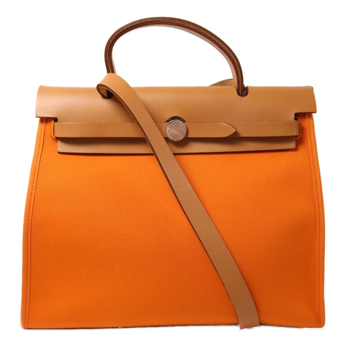 Hermes Herbag PM Orange Canvas 2 Way Shoulder Bag with Palladium Hardware: Hermes Herbag PM Orange Canvas 2 Way Shoulder Bag with Palladium Hardware This Hermes Herbag PM is a versatile 2-way shoulder bag crafted from durable orange canvas. Designed for women, it offers both
