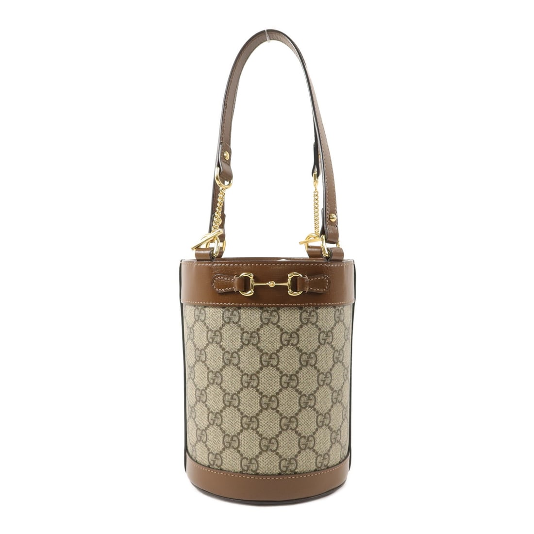 Gucci Horsebit 1955 Brown PVC Coated Canvas Tote Bag: Gucci Horsebit 1955 Brown PVC Coated Canvas Tote Bag This GUCCI Horsebit 1955 bucket tote bag is crafted from brown PVC coated canvas and features gold-tone hardware. Designed as a compact tote, it of