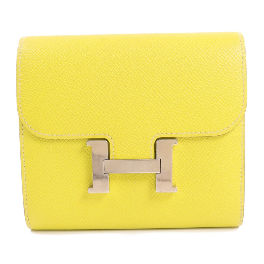 Hermes Constance Slim bi-fold wallet Epsom leather yellow PHW: Hermes Constance Slim bi-fold wallet Epsom leather yellow PHW This Hermes Constance Slim Wallet features a bi-fold design crafted from Epsom calfskin leather in a vibrant lime yellow color. Made in Fr