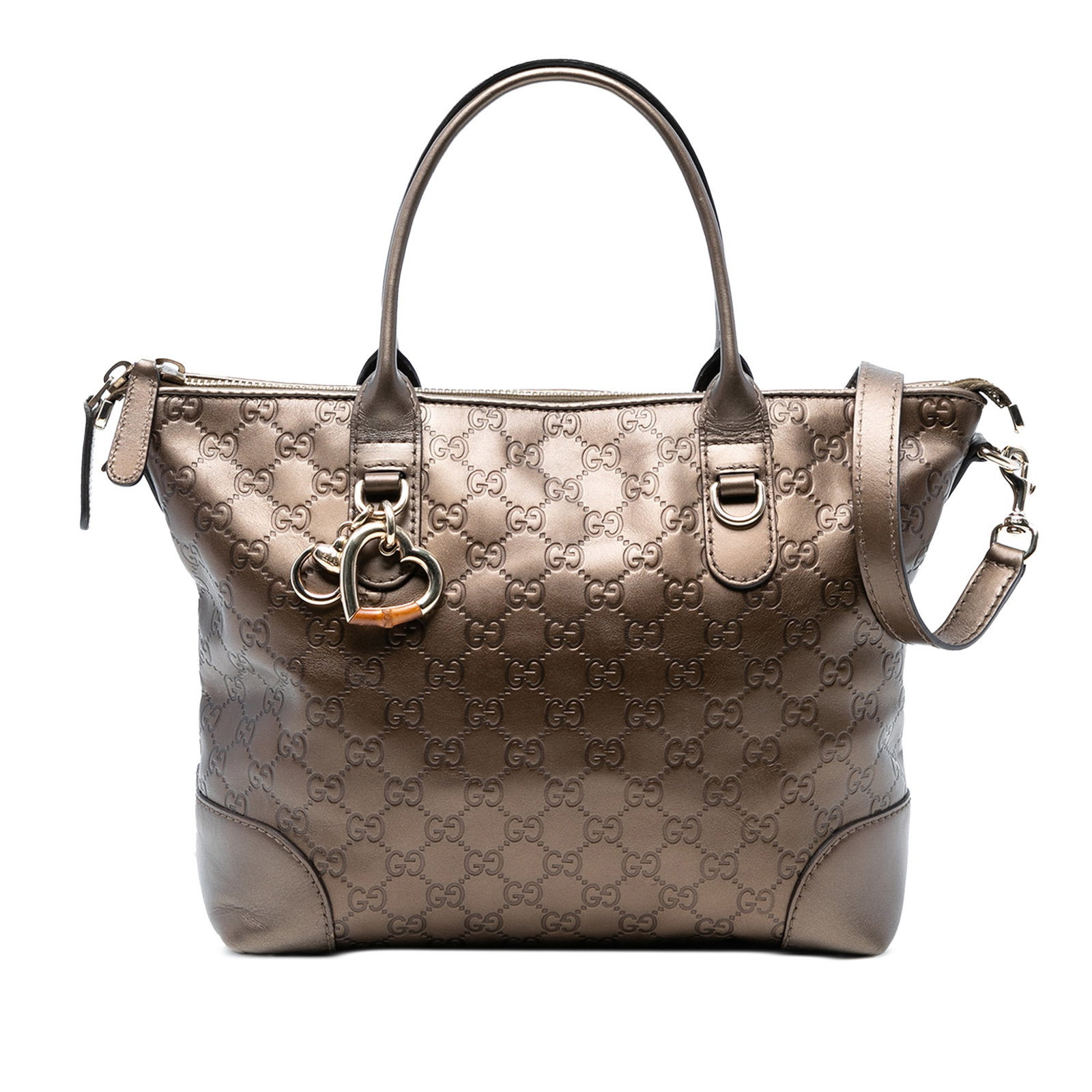 Gucci Metallic Guccissima Heart Bit Tote Leather Bag: Gucci Metallic Guccissima Heart Bit Tote Leather Bag Introducing the Metallic Guccissima Heart Bit Tote, a stylish satchel crafted from premium leather. This elegant bag features flat leather handles 