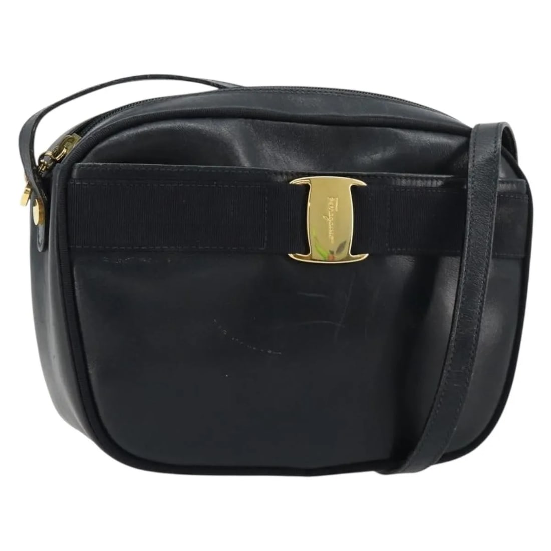 Salvatore Ferragamo Vala Navy Leather Shoulder Bag: Salvatore Ferragamo Vala Navy Leather Shoulder Bag Salvatore Ferragamo Vala leather bag in navy. Made in Italy, this women's bag is presented in fair condition with visible wear throughout, including 