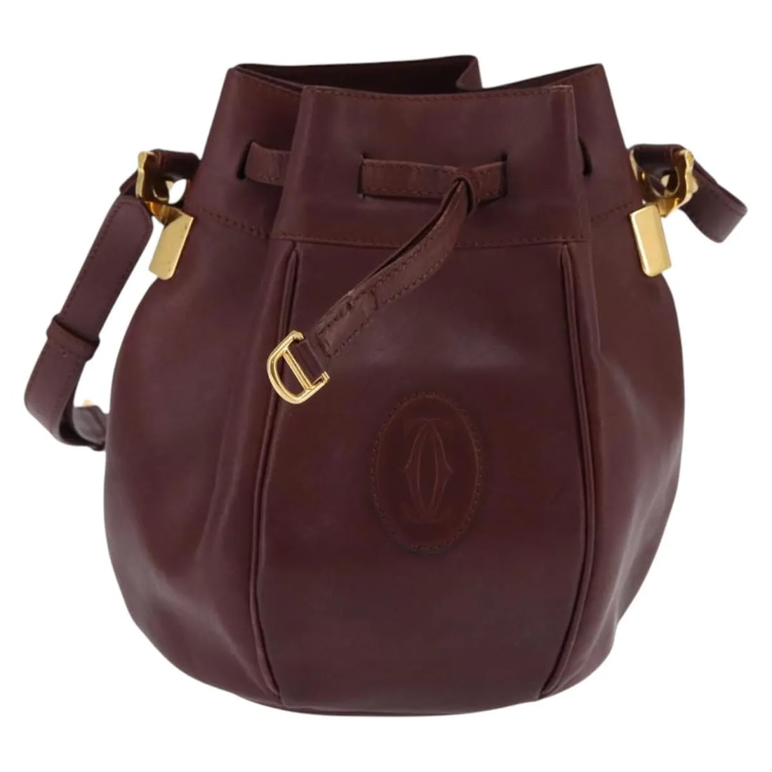 Cartier Must de Cartier Burgundy Leather Shoulder Bag: Cartier Must de Cartier Burgundy Leather Shoulder Bag Cartier Must de Cartier leather bag in burgundy. This vintage piece is in good condition with honest wear consistent with age and use. Noted condi