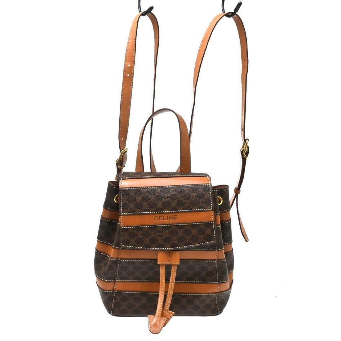 CELINE Macadam Brown PVC Leather Medium Backpack Italy: CELINE Macadam Brown PVC Leather Medium Backpack Italy Celine Macadam backpack in brown PVC and leather with logo accents. This medium backpack is made in Italy and features an interior pocket. It sho