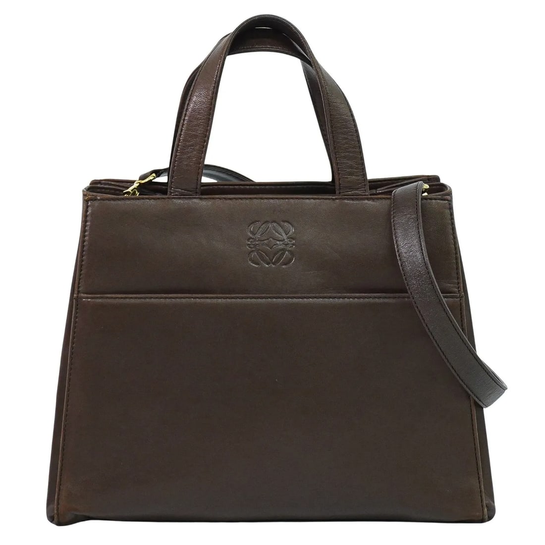 Loewe Vintage Anagram Brown Leather Handbag: Loewe Vintage Anagram Brown Leather Handbag This Loewe Vintage Anagram handbag is crafted from brown leather and designed for women. The bag features the signature Anagram motif and was made in Spain.