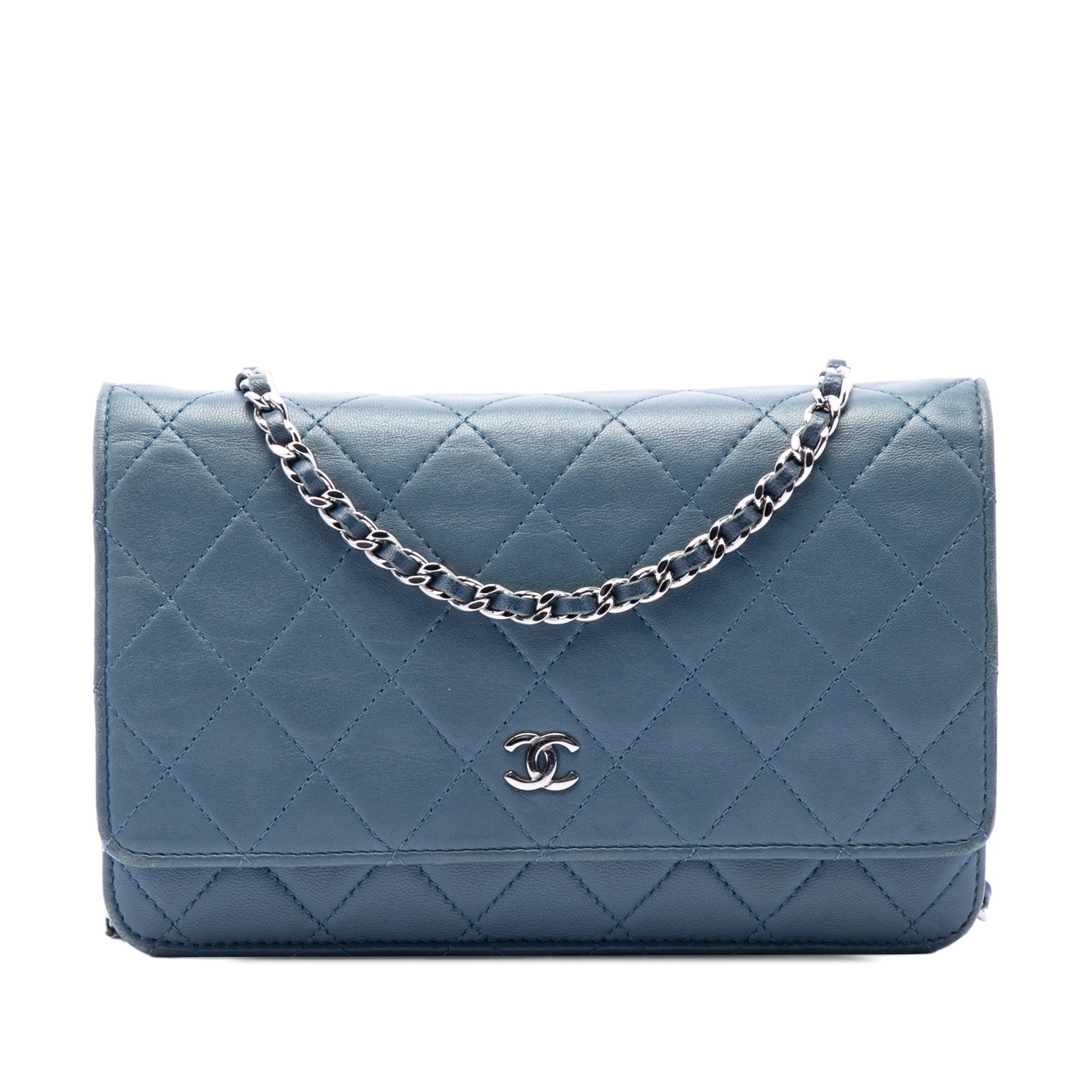 Chanel blue quilted lambskin wallet on chain: Chanel blue quilted lambskin wallet on chain This Chanel CC Quilted Lambskin Wallet On Chain features a blue quilted lambskin leather body with a leather-woven chain shoulder strap. It includes a fron