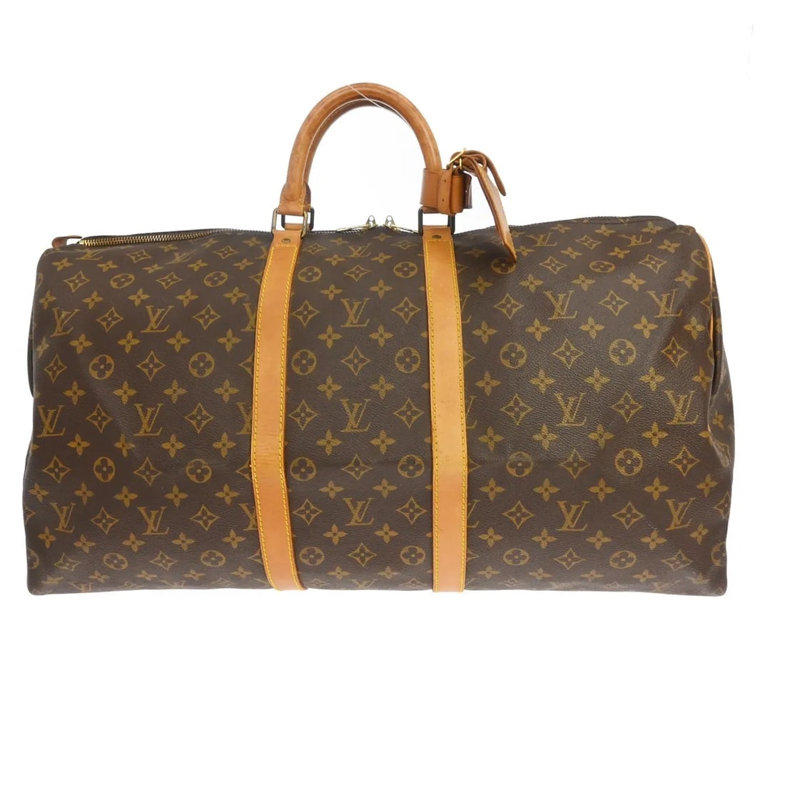 Louis Vuitton Keepall Travel Bag in Brown Monogram Canvas: Louis Vuitton Keepall Travel Bag in Brown Monogram Canvas Louis Vuitton Keepall in brown monogram canvas. This unisex travel bag is made in France and remains in good condition with visible wear from 