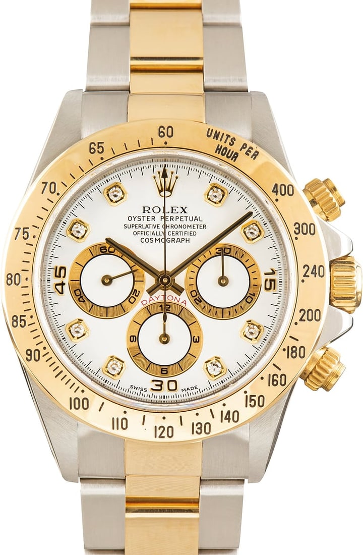 Rolex Daytona Oyster 16523 White Diamond Dial: Rolex Daytona Oyster 16523 White Diamond Dial This is a Rolex Daytona watch featuring a white diamond dial and a fixed bezel. The timepiece is designed for men and is equipped with an Oyster bracelet.