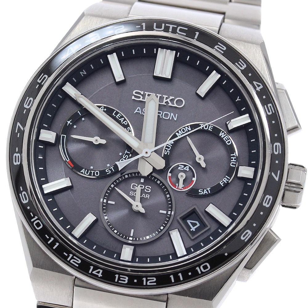 SEIKO Astron Nextar titanium solar GPS men's wristwatch: SEIKO Astron Nextar titanium solar GPS men's wristwatch This SEIKO Astron Nextar GPS Day-Date men's wristwatch features a titanium case and band with a gray dial. The watch is powered by a solar radio