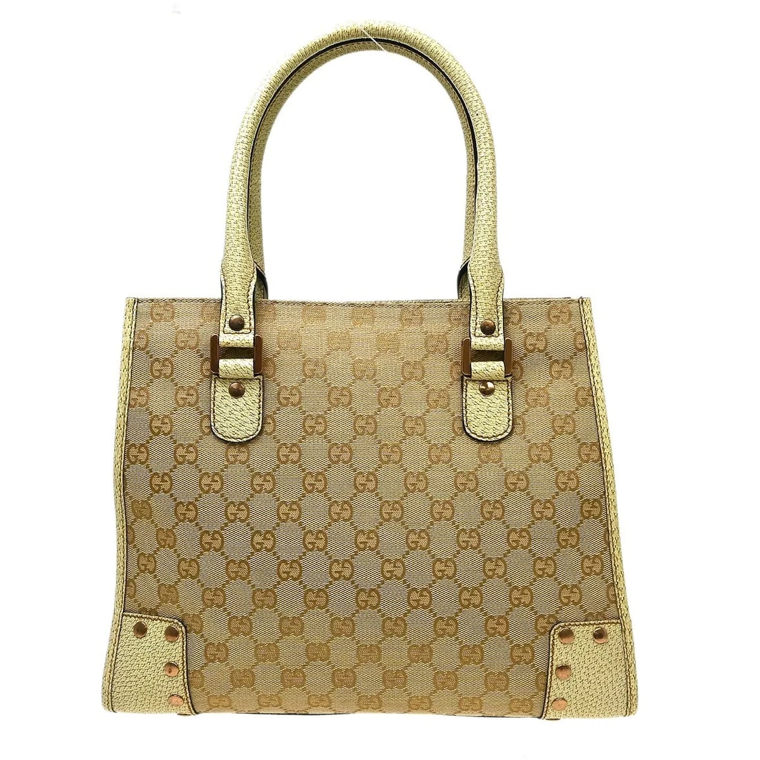 Gucci Miss GG Tote Bag Beige Canvas Leather Trim: Gucci Miss GG Tote Bag Beige Canvas Leather Trim Gucci Miss GG Tote in beige canvas with leather trim. Made in Italy, this tote is presented in fair condition with visible wear throughout, including s