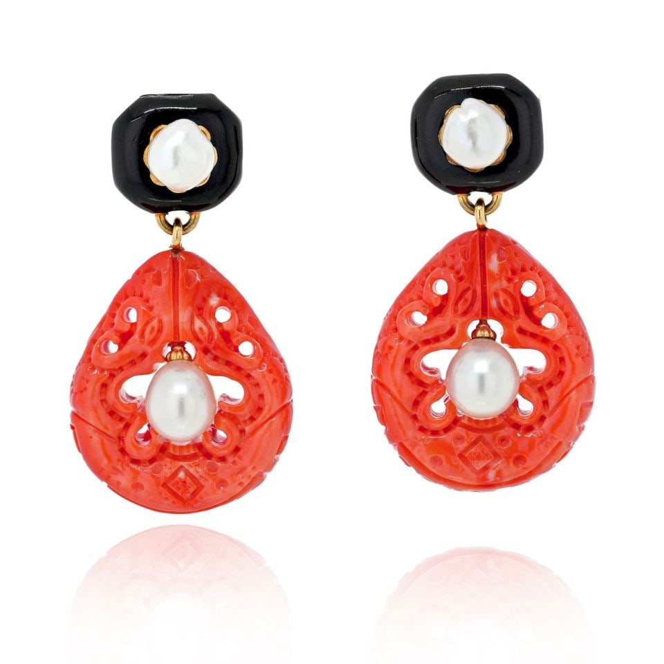 David Webb Platinum 18K Gold Coral Pearl Clip Earrings: David Webb Platinum 18K Gold Coral Pearl Clip Earrings Exquisite David Webb clip earrings crafted from a stunning combination of platinum and 18K yellow gold. These earrings feature elegant surmounts 