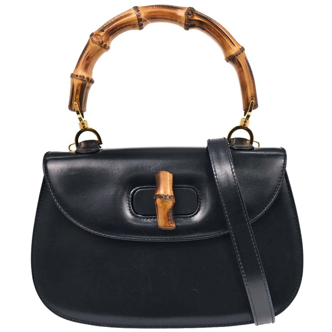 Gucci Bamboo 2way Leather Top Handle Bag with Strap: Gucci Bamboo 2way Leather Top Handle Bag with Strap Gucci Bamboo 2way handbag in navy leather with bamboo accents and a brown top handle. This medium women's bag features a structured top handle desig