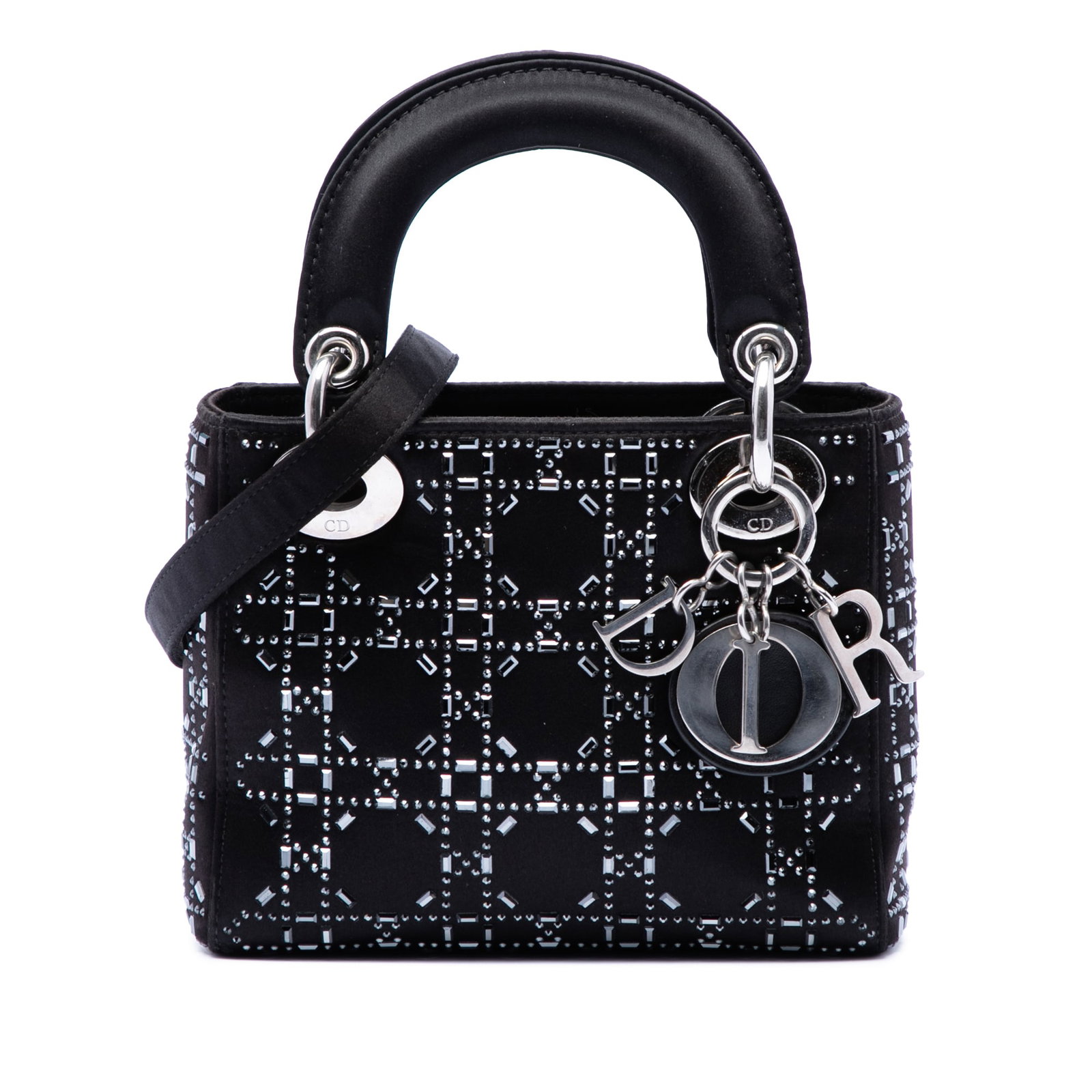 Dior Mini Satin Cannage Crystal Lady Dior Bag: Dior Mini Satin Cannage Crystal Lady Dior Bag This Mini Satin Cannage Lady Dior bag features a black satin body adorned with crystal embellishments, flat satin handles, and a detachable strap. It has 