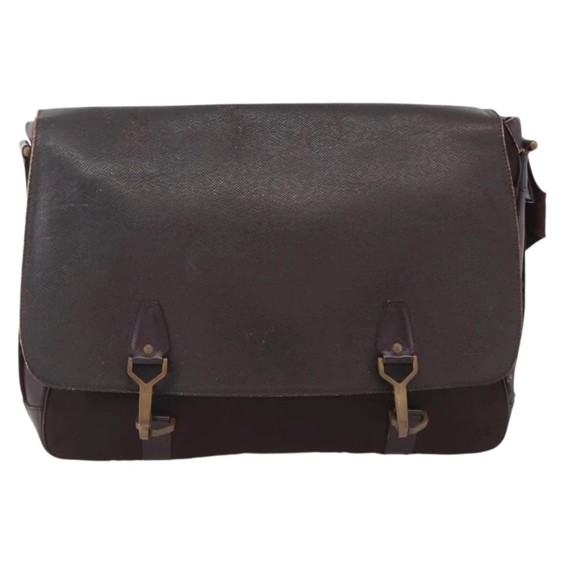 Dersou Unisex Bag in Brown Taiga Leather and Canvas by Louis Vuitton: Dersou Unisex Bag in Brown Taiga Leather and Canvas by Louis Vuitton The Louis Vuitton Dersou Bag features a combination of Taiga leather and canvas in a brown color, designed for unisex use. This bag