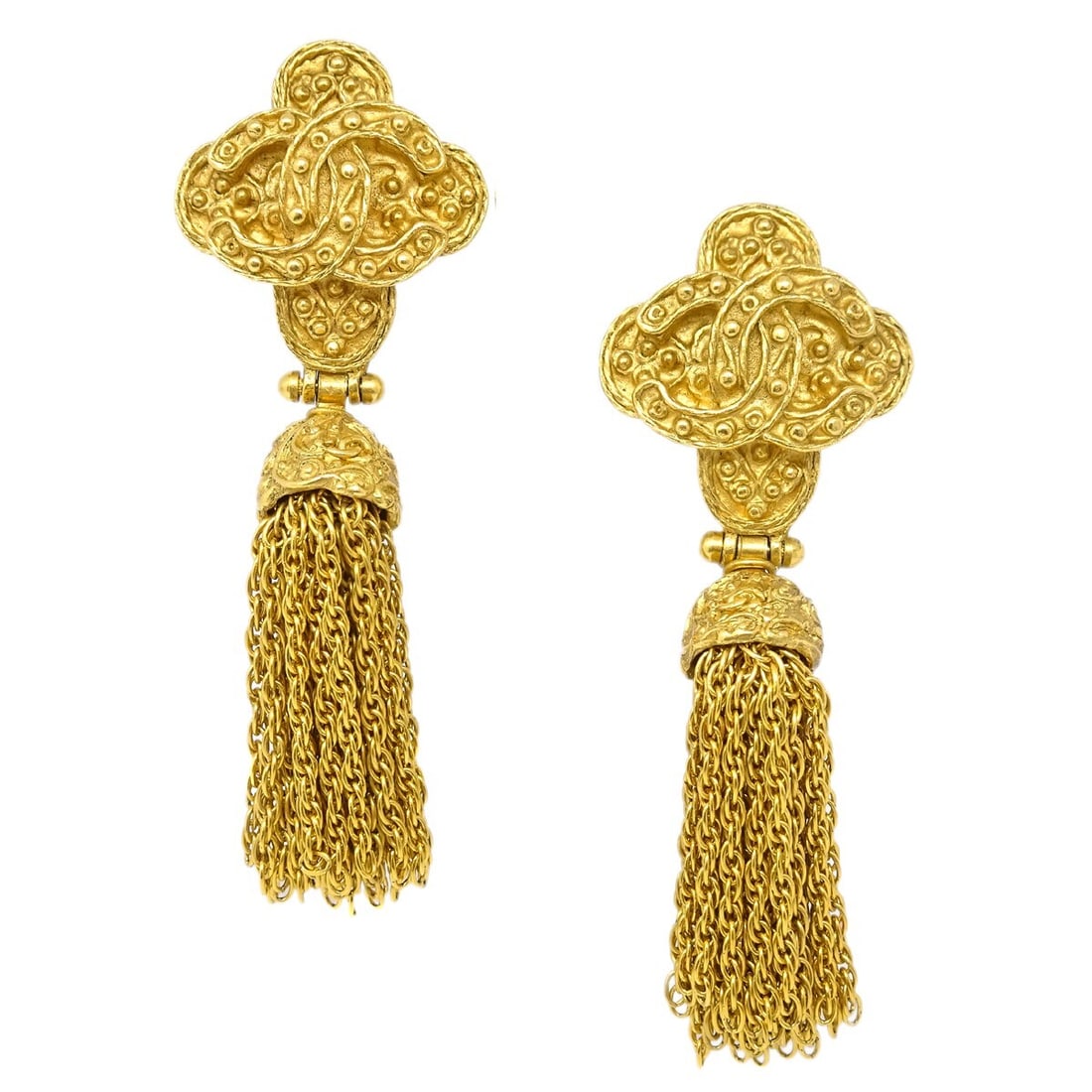 Chanel 94A Gold Plated Clip On Fringe Logo Earrings: Chanel 94A Gold Plated Clip On Fringe Logo Earrings Clip-on Chanel dangle earrings featuring a fringe charm design with logo theme details. Made in France in gold-plated metal, these earrings are pres
