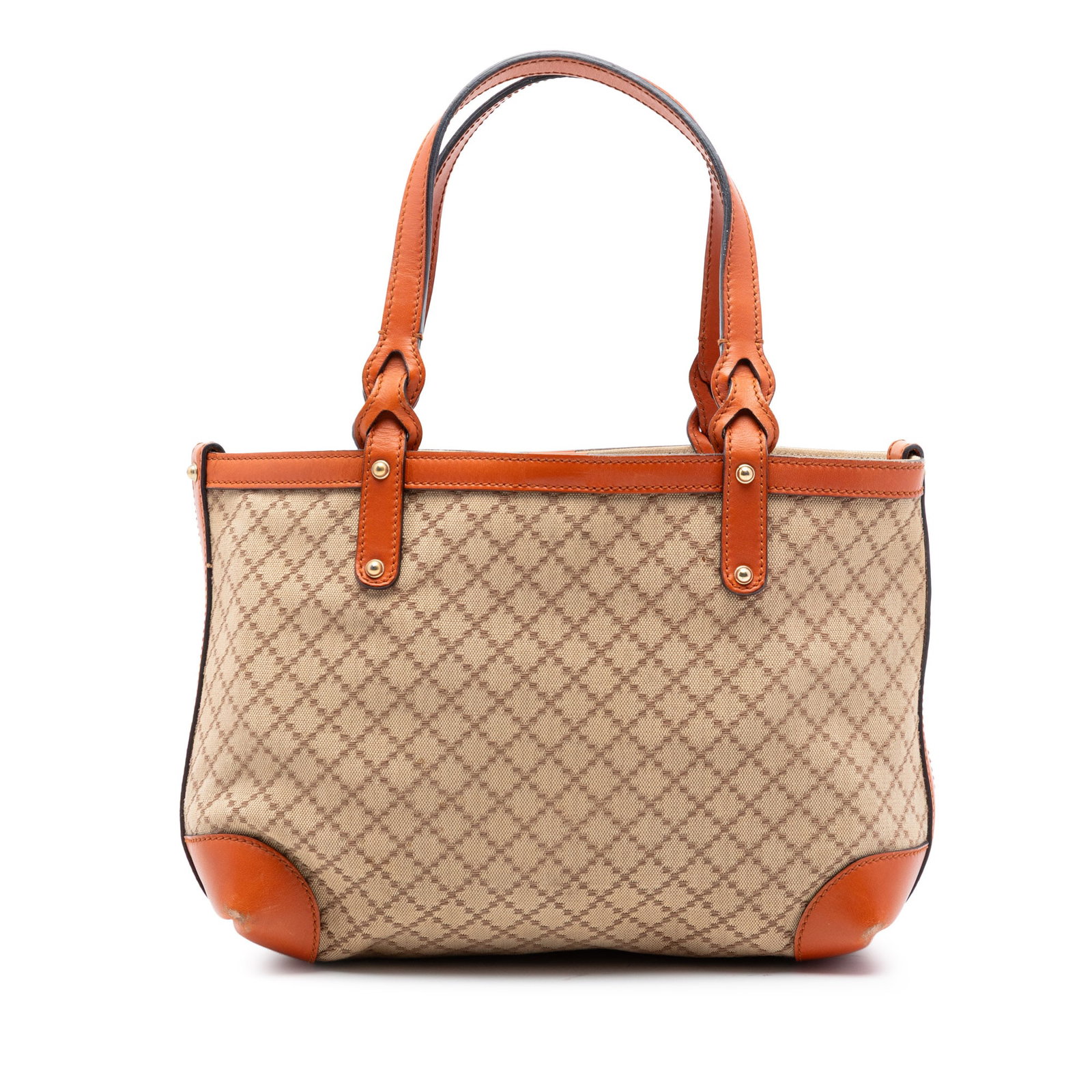 Gucci beige canvas tote with leather trim and zip pouch: Gucci beige canvas tote with leather trim and zip pouch This Gucci Small Diamante Canvas Craft Tote features a beige canvas body with leather trim and flat leather handles. The bag has an open top sec