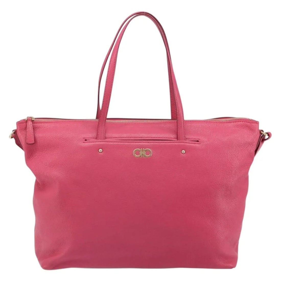 Gancini Tote Bag in Pink Leather by Salvatore Ferragamo: Gancini Tote Bag in Pink Leather by Salvatore Ferragamo This Salvatore Ferragamo Gancini Tote is crafted from pink leather and designed for women. The tote features a spacious silhouette with slight r