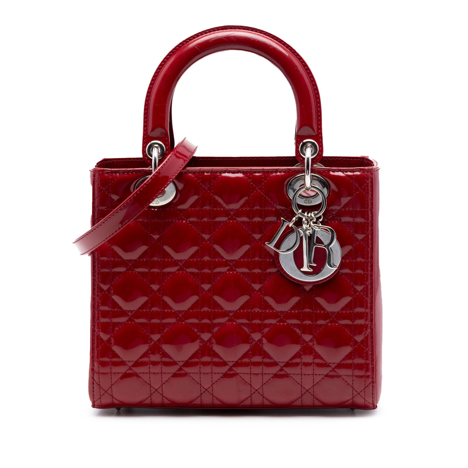 Dior Medium Patent Cannage Lady Dior Red Leather Bag: Dior Medium Patent Cannage Lady Dior Red Leather Bag This Medium Patent Cannage Lady Dior bag features a quilted patent leather exterior in red, flat leather top handles, and a detachable flat leather