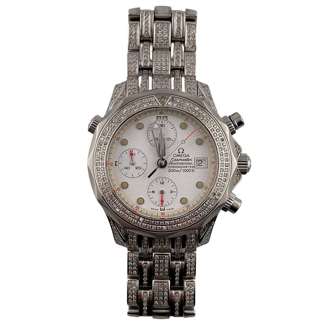 Omega Seamaster 2598.20 Men's Watch with White Dial and Diamond Accents: Omega Seamaster 2598.20 Men's Watch with White Dial and Diamond Accents This Omega Seamaster men's watch features a white dial, a diamond-set bezel, and a diamond-adorned bracelet. The watch is identi