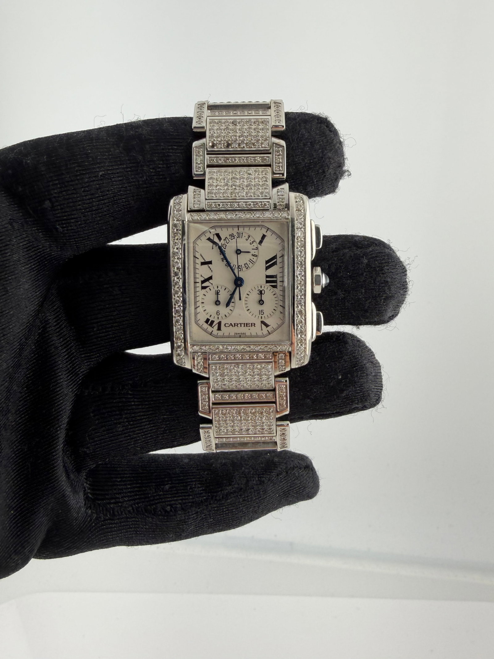 Cartier Tank Francaise Reference 2303 Unisex Watch White Dial Diamond Bezel and Bracelet: Cartier Tank Francaise Reference 2303 Unisex Watch White Dial Diamond Bezel and Bracelet This Cartier Tank Francaise model 2303 features a white dial, a diamond-set bezel, and a diamond bracelet. Desi