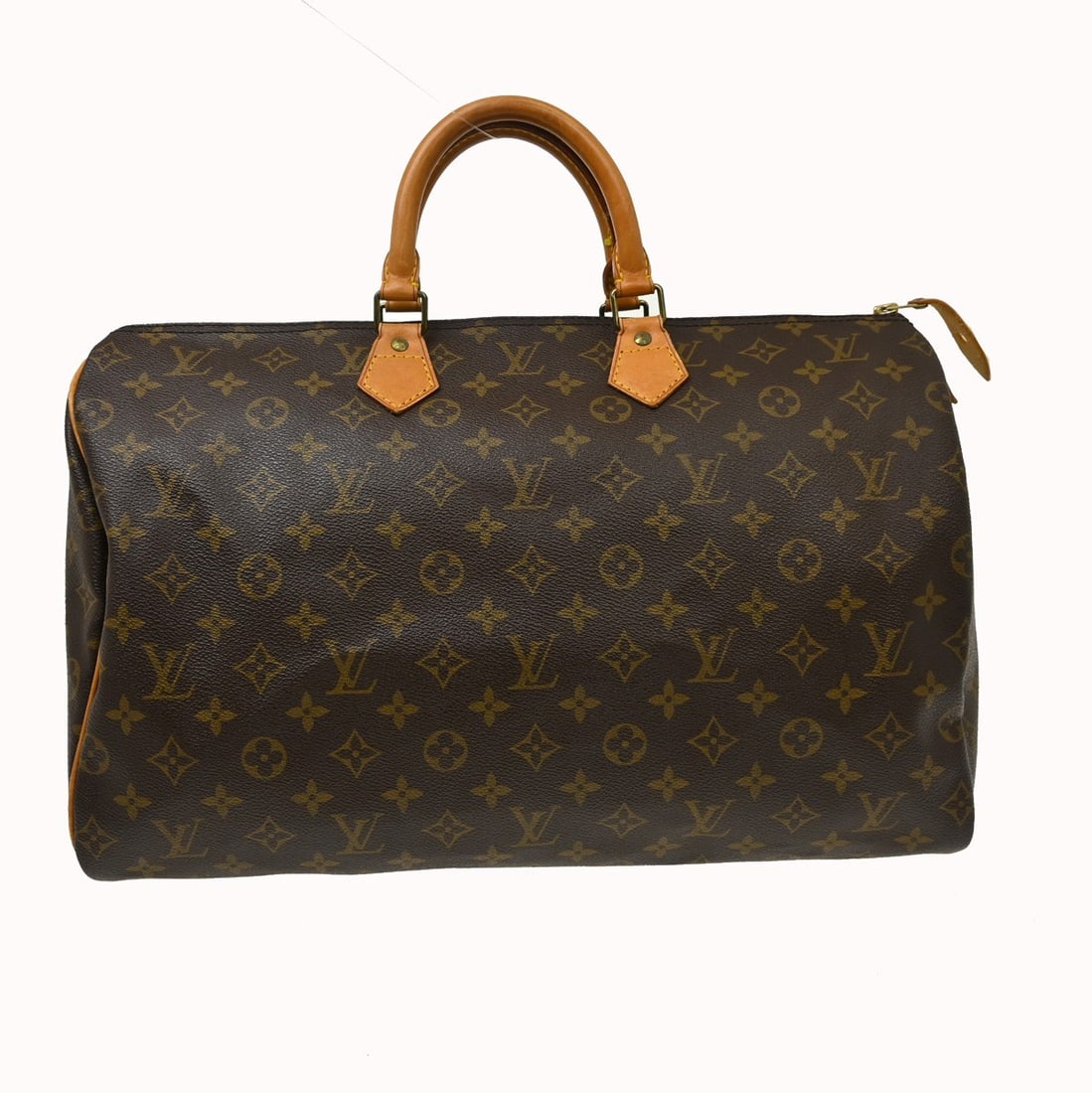 Louis Vuitton Speedy 40 Monogram Canvas Duffle Bag M41522: Louis Vuitton Speedy 40 Monogram Canvas Duffle Bag M41522 Vintage Louis Vuitton Speedy 40 handbag in brown monogram canvas with leather trim and double handles. This duffle-style bag features a zip cl