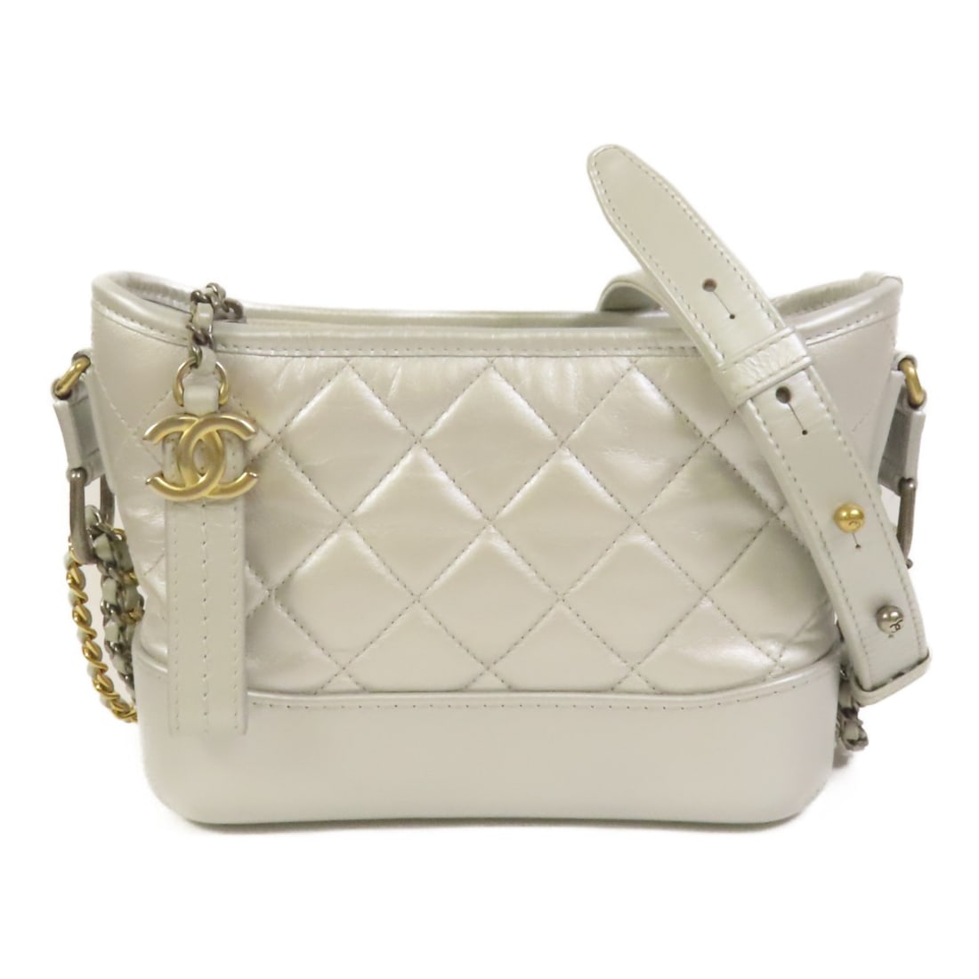 Chanel Gabrielle Small Silver Calfskin CC Chain Shoulder Bag: Chanel Gabrielle Small Silver Calfskin CC Chain Shoulder Bag This CHANEL CC Gabrielle Small Chain Shoulder Bag features a stylish design crafted from silver calfskin leather. Designed for women, it of