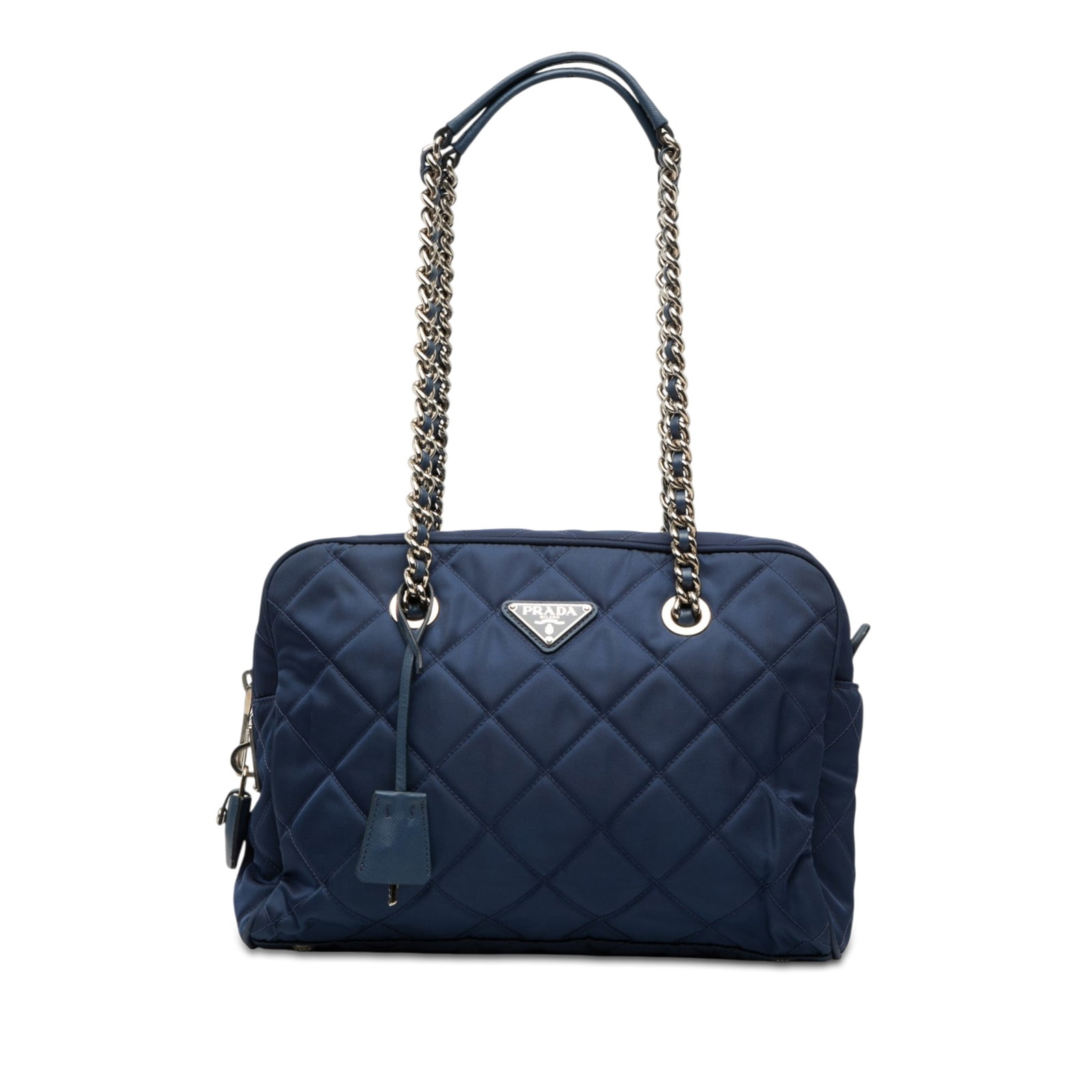 Prada Impuntu Tessuto Blue Quilted Nylon Shoulder Bag: Prada Impuntu Tessuto Blue Quilted Nylon Shoulder Bag Prada Impuntu Tessuto Chain Shoulder Bag in blue with a quilted fabric body and leather-woven chain link straps with leather guards. The bag featu