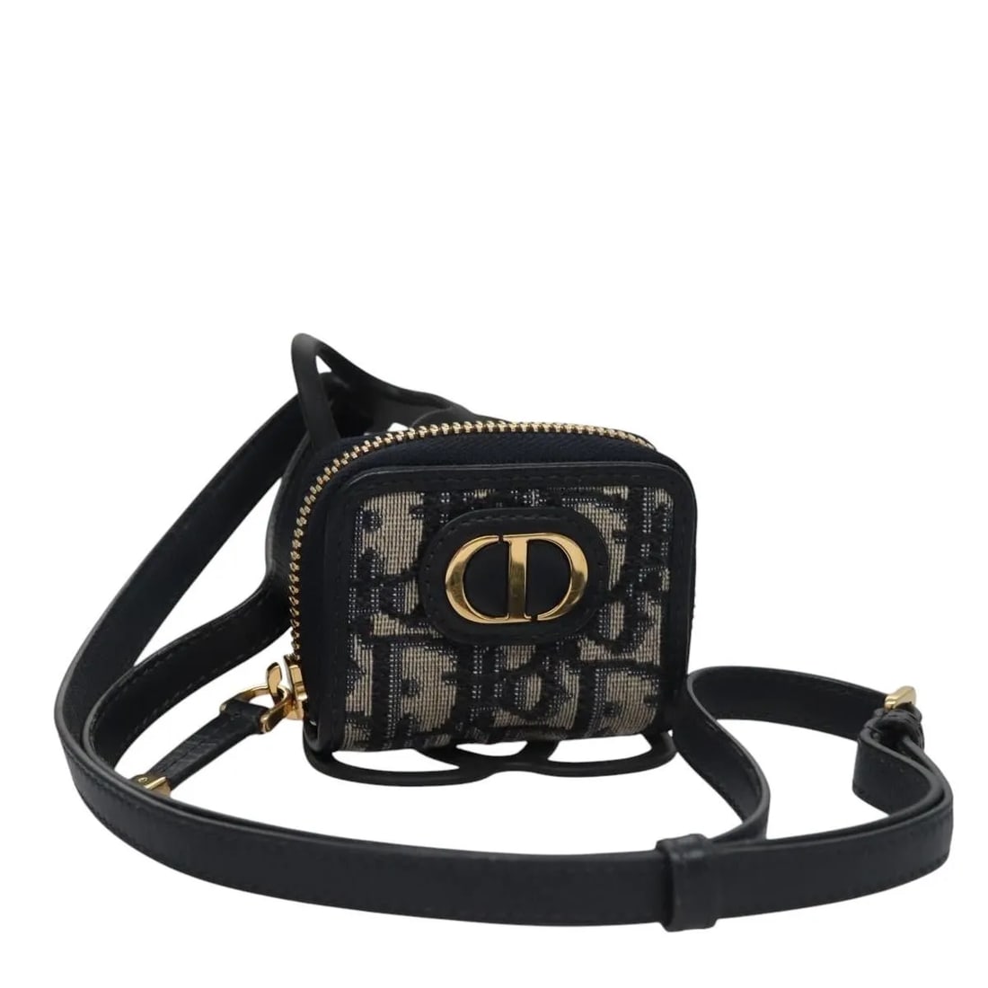 Christian Dior Trotter Navy Canvas French Wallet: Christian Dior Trotter Navy Canvas French Wallet This Christian Dior Trotter French Wallet features the iconic Diorissimo canvas in a navy color. Designed for women, it offers a compact and stylish ac