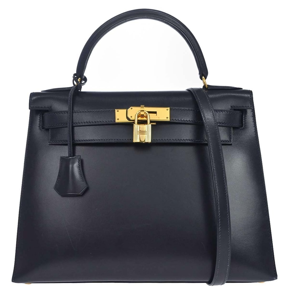 HERMES Kelly 28 Sellier Box Calf Satchel Blue Indigo: HERMES Kelly 28 Sellier Box Calf Satchel Blue Indigo Hermes Kelly 28 Sellier 2-way handbag in Blue Indigo Box Calf leather. This structured top handle satchel features a turn-lock closure and includes