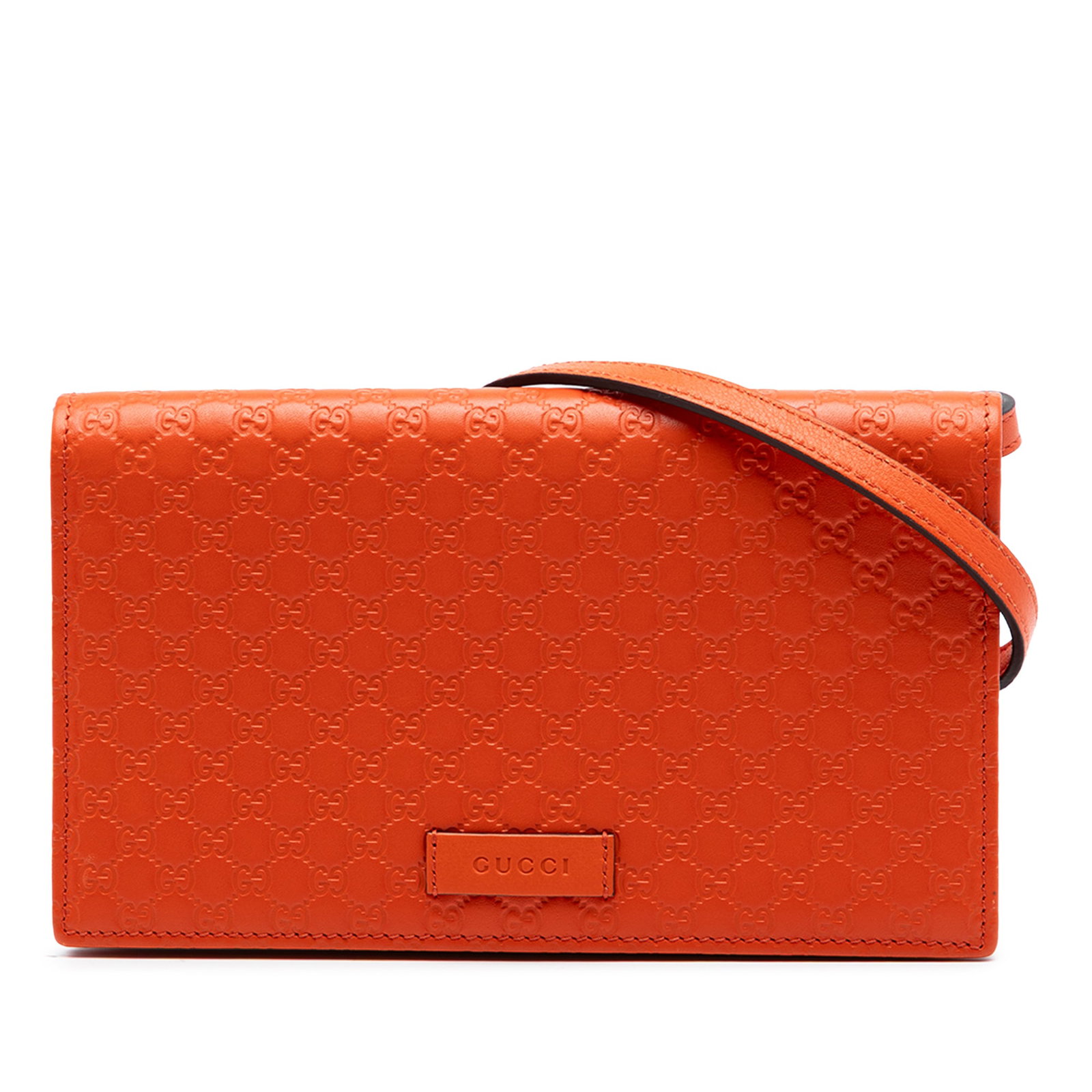 Gucci orange embossed leather crossbody wallet strap: Gucci orange embossed leather crossbody wallet strap This Gucci Microguccissima Wallet on Strap is crafted from embossed leather in a vibrant orange shade. Designed for versatility, it features a flat
