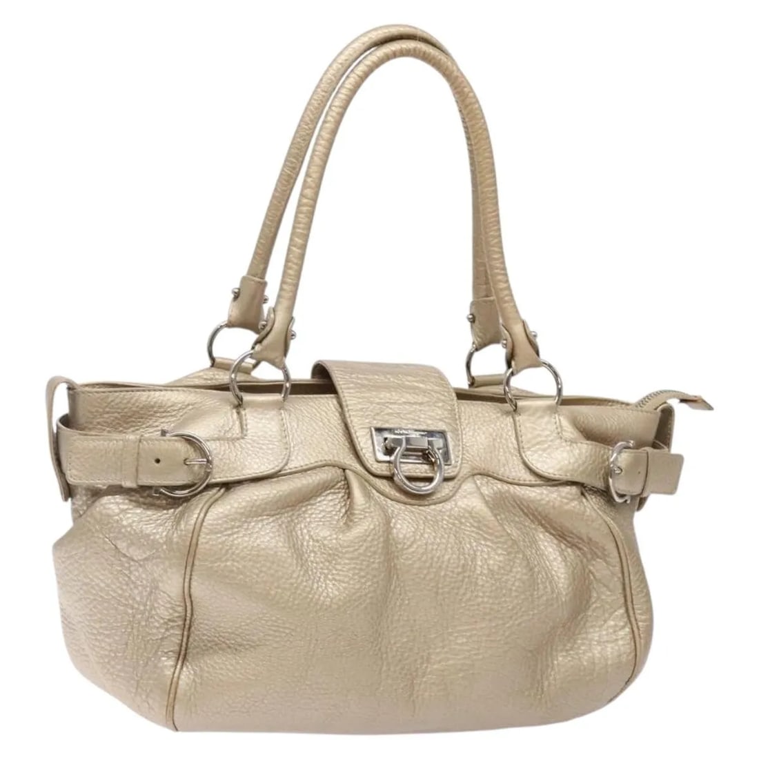 Leather Marisa Satchel by Salvatore Ferragamo in Gold 35cm: Leather Marisa Satchel by Salvatore Ferragamo in Gold 35cm This Salvatore Ferragamo Marisa Satchel for women features a gold leather exterior with metal fittings. The bag shows signs of light wear inc