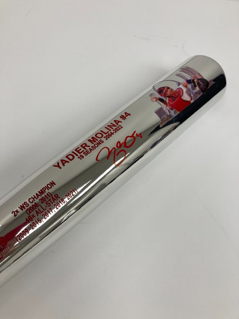 Beckett BAS Certified Yadier Molina Signed Chrome Career Stat Art Bat: Beckett BAS Certified Yadier Molina Signed Chrome Career Stat Art Bat This limited-edition baseball bat is signed by Yadier Molina and features a chrome finish in St. Louis colors. It is laser engrave