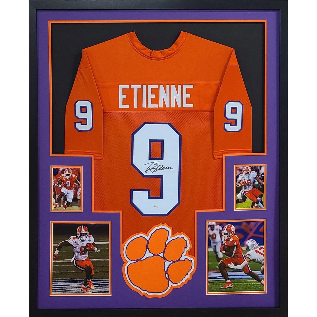 Travis Etienne Signed Framed Jersey JSA Authenticated Clemson Jaguars: Travis Etienne Signed Framed Jersey JSA Authenticated Clemson Jaguars This is an autographed Travis Etienne framed jersey, showcasing his association with Clemson and the Jacksonville Jaguars. Authent