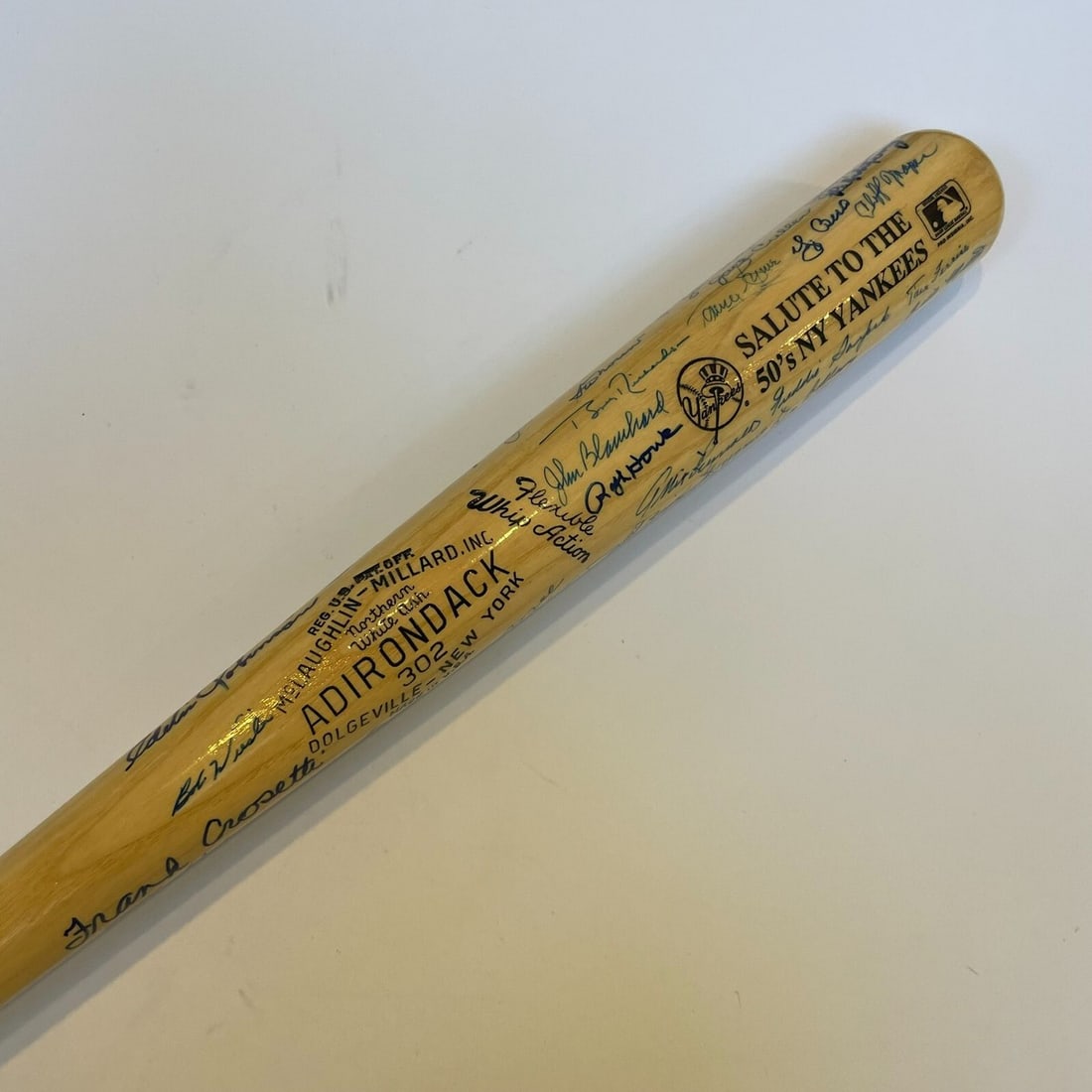 1950s New York Yankees Multi-Signed 34in Baseball Bat 50+ Autographs: 1950s New York Yankees Multi-Signed 34in Baseball Bat 50+ Autographs Commemorate the legendary 1950s New York Yankees with this multi-signed baseball bat. This original Adirondack bat measures 34 inch