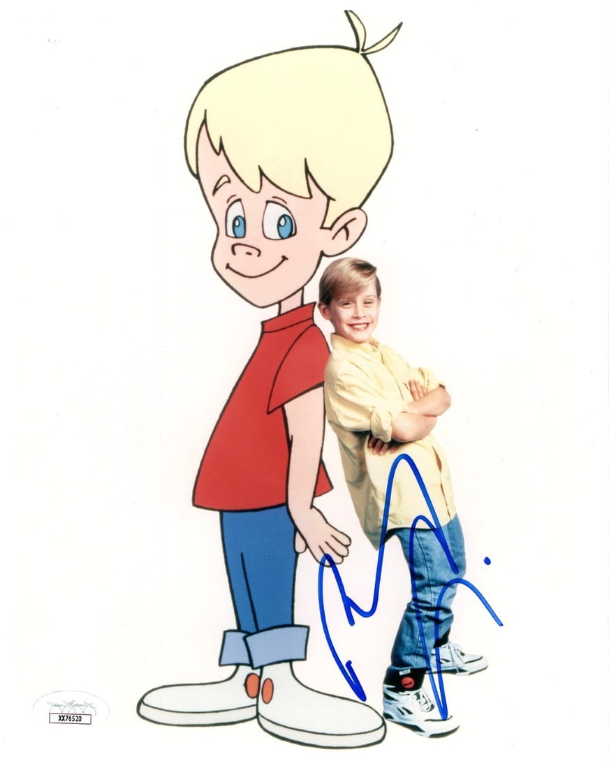 8x10 Photograph Signed by Macaulay Culkin JSA Authenticated: 8x10 Photograph Signed by Macaulay Culkin JSA Authenticated This is an original 8x10 photograph featuring Macaulay Culkin standing with a cartoon, personally signed by Macaulay Culkin. The autograph h