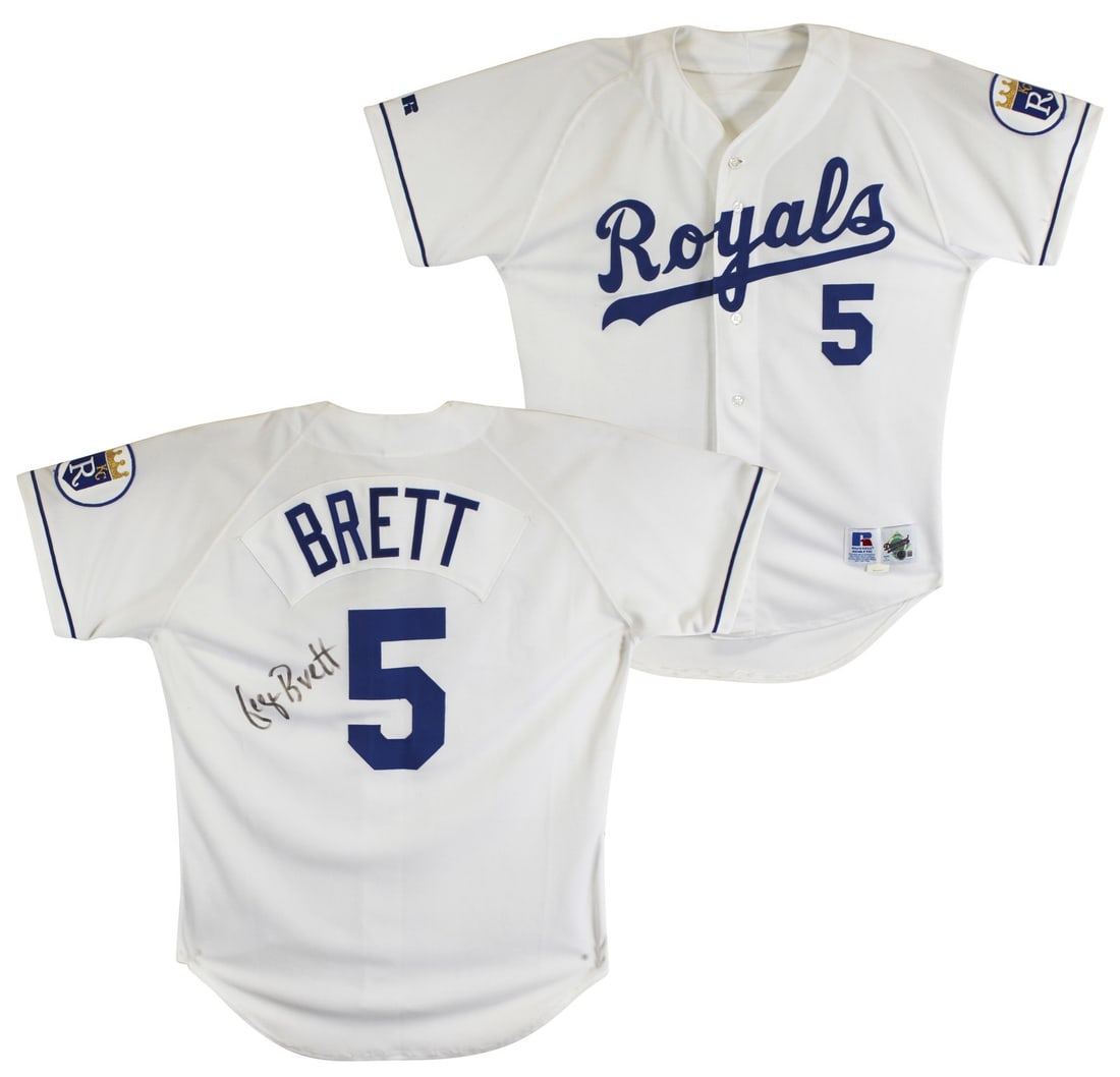 George Brett Signed Kansas City Royals White Jersey Beckett Authenticated: George Brett Signed Kansas City Royals White Jersey Beckett Authenticated This authentic white jersey from Russell Athletic is a standout piece for any Kansas City Royals fan. Personally signed by bas