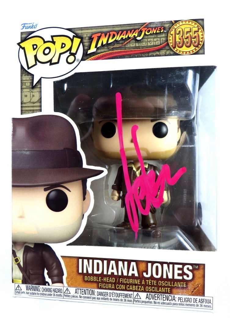 Harrison Ford Autographed Funko POP Indiana Jones Beckett Authenticated: Harrison Ford Autographed Funko POP Indiana Jones Beckett Authenticated This Funko POP! figure features the iconic Indiana Jones character, signed by the legendary actor Harrison Ford. The item comes 