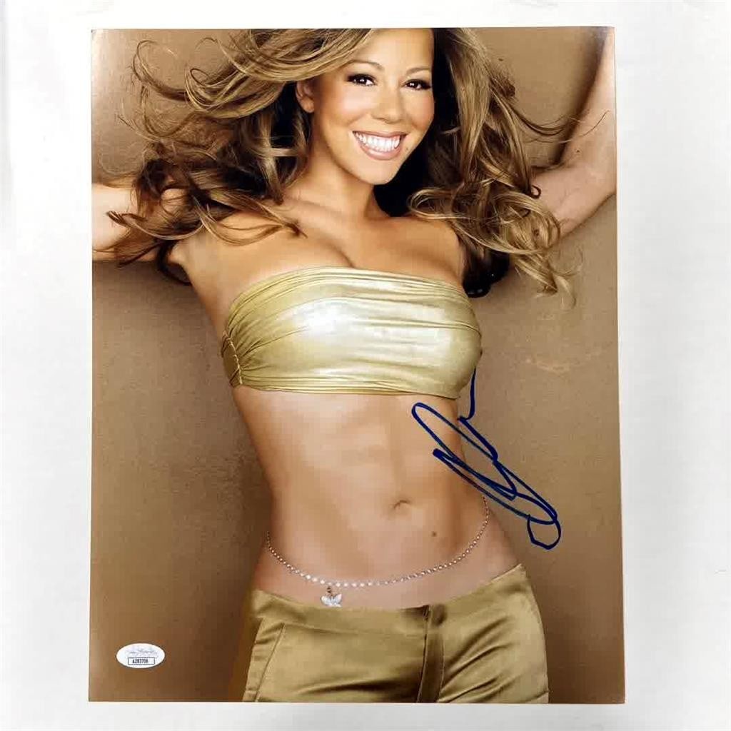 Autographed 11x14 Photograph of Mariah Carey with JSA Authentication: Autographed 11x14 Photograph of Mariah Carey with JSA Authentication This is an original 11x14 photograph poster signed by Mariah Carey. The autograph has been authenticated by James Spence Authentica